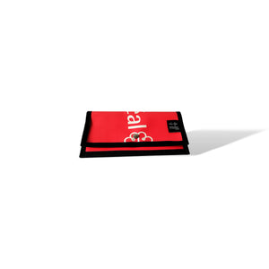 Portefeuille avec poche de monnaie fait de bannière publicitaire récupérée. Il est fabriqué 100% au Québec, Canada. Couleur: rouge Montréal et logo blanc